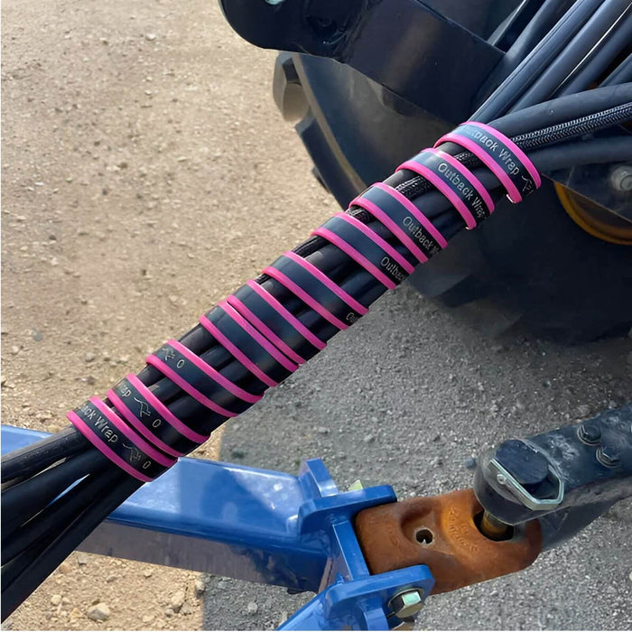 Outback Wrap Hose Tamer organizing hydraulic hoses on farm implements and agricultural equipment, part 40X1HTBLU2