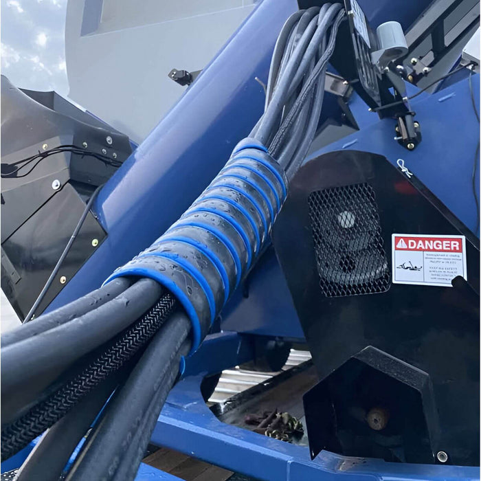 Outback Wrap Hose Tamer organizing hydraulic hoses on farm implements and agricultural equipment, part 40X1HTRED7