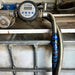 Outback Wrap Fuel Finder blue wrap installed on a DEF fuel hose to clearly identify diesel exhaust fluid lines, Part 20X4GRYB