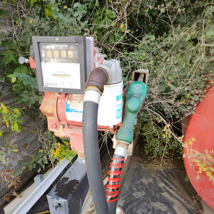Outback Wrap Fuel Finder red wrap installed on a dyed diesel fuel hose to prevent fuel mix-ups, Part 20X4GRYB